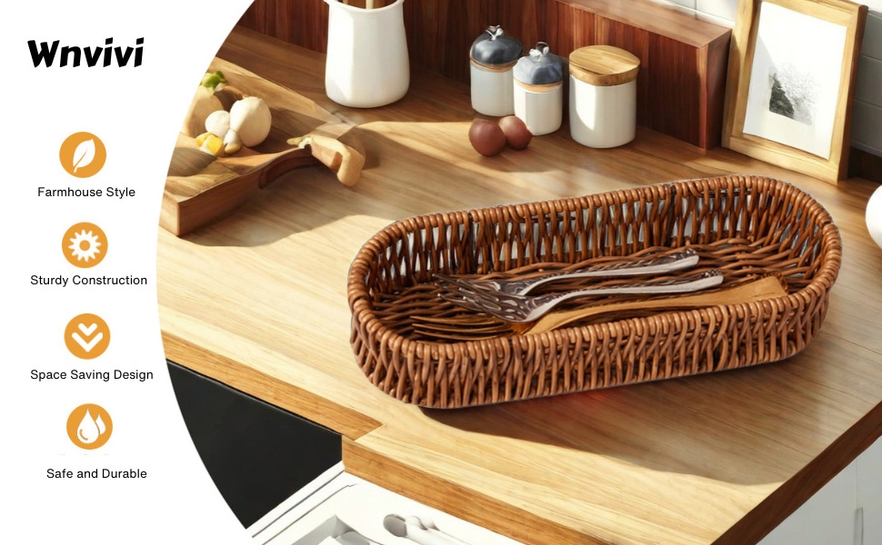 Woven oval basket on wooden surface with candles and picture frame. Image includes product features: handmade style, multi-purpose usage, and safe and durable.