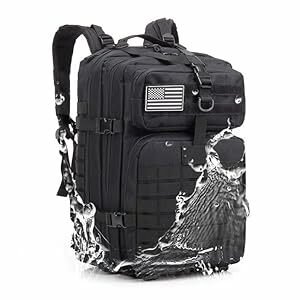 Tactical backpack in black with American flag patch, featuring eagle graphic design. Multiple compartments and military-style construction visible.