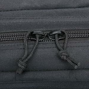 Black zipper pull detail with knotted cord pulls against dark grey textile material.