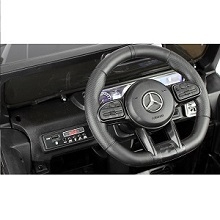 the steering wheel of a mercedes benz unimog