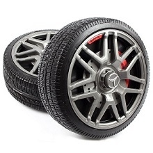 a pair of car tires on a white background.