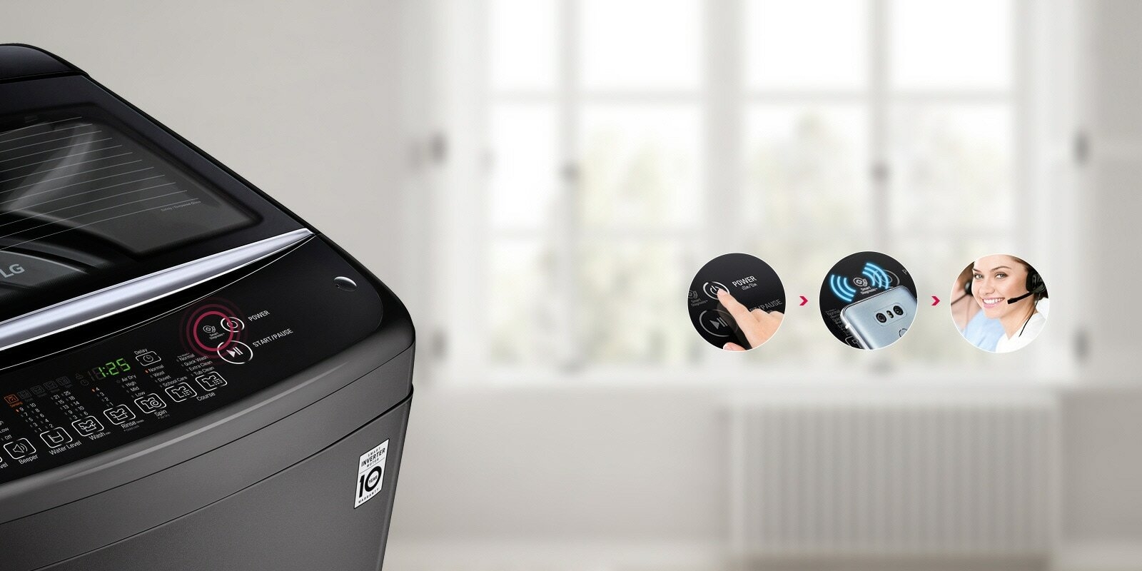 LG T1366NEHV2 The top of the washer is shown in the background and a hand holding a phone looking at the