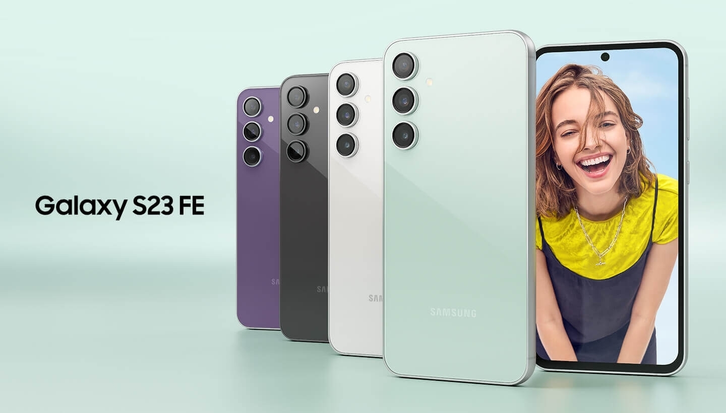 Five Galaxy S23 FE devices in Purple, Graphite, Cream and Mint. Four are seen standing upright …