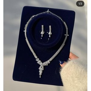 silver-toned bridal jewelry set 