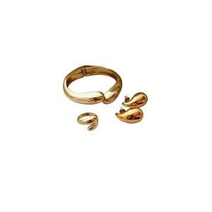 Ladies Classy Bangle plus earing and a ring-gold