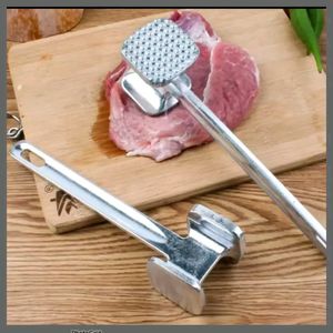 Dual sided meat tenderizer