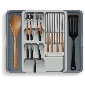Expandable cutlery drawer organizer tray. 