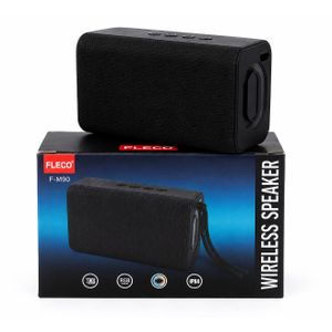 Bluetooth speaker features a compact rectangular design with a built-in wrist strap.