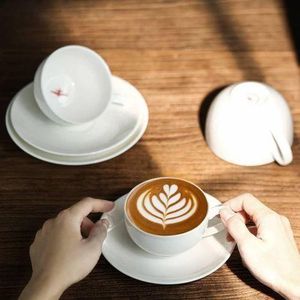 Elegant Ceramic Cup and Saucer Set with Spoons 