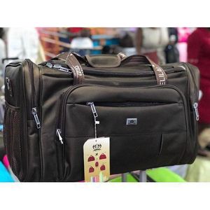 A Traveling Bag For Trips And Touring With Durable Material It Has Multiple Colours It Has Hard Body It Has Water Proof Material