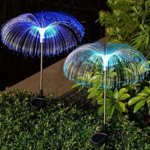 2pcs solar-powered LED jellyfish fire fly lights used for outdoor garden decoration.